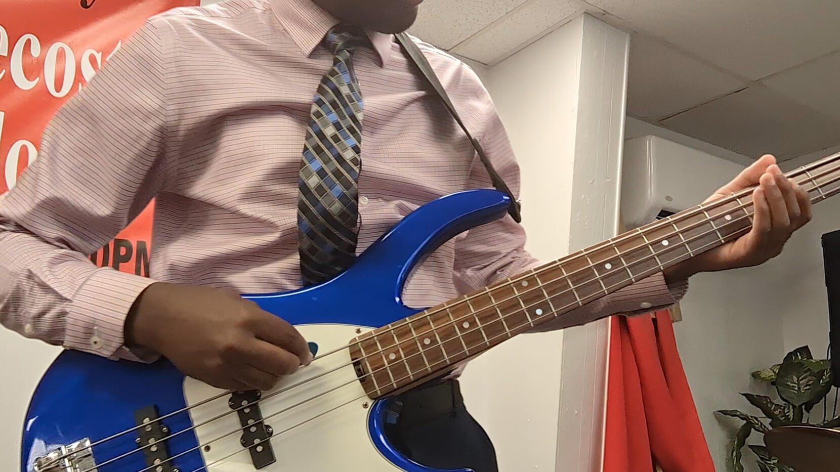 Playing the bass guitar and drums